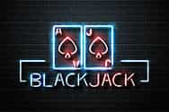 Letrero con la palabra blackjack y dos naipes.