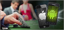 Sobre un tapete verde, se pueden ver dos smartphones con los logos de Android y Apple en sus pantallas y una mano levantando unas cartas.