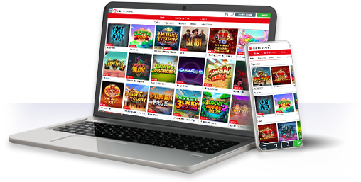 Un ordenador y un móvil con la oferta de juegos de Genting Casino.