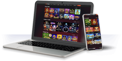 Un ordenador y un móvil con la oferta de juegos de MARCA Apuestas