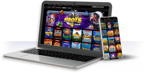 Un ordenador y un móvil con la oferta de juegos de PokerStars
