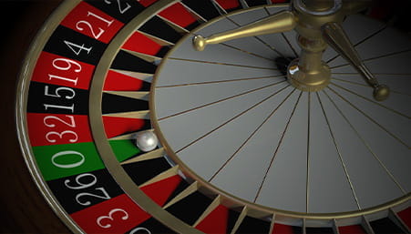 Cilindro de una ruleta con la bola en el cero.