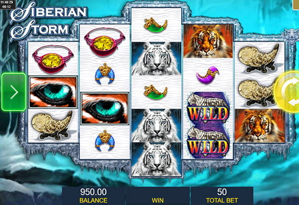 Partida a la slot Siberian Storm con algunos de los principales símbolos del juego: los tigres, el comodín, los amuletos de diferentes colores y el ojo de tigre.