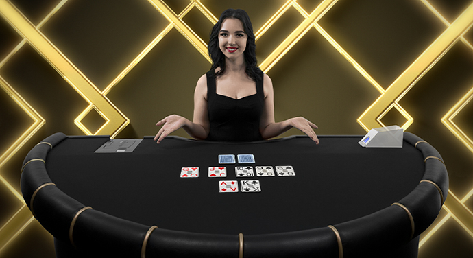 Una mesa del juego Texas Hold'em en vivo con crupier real.