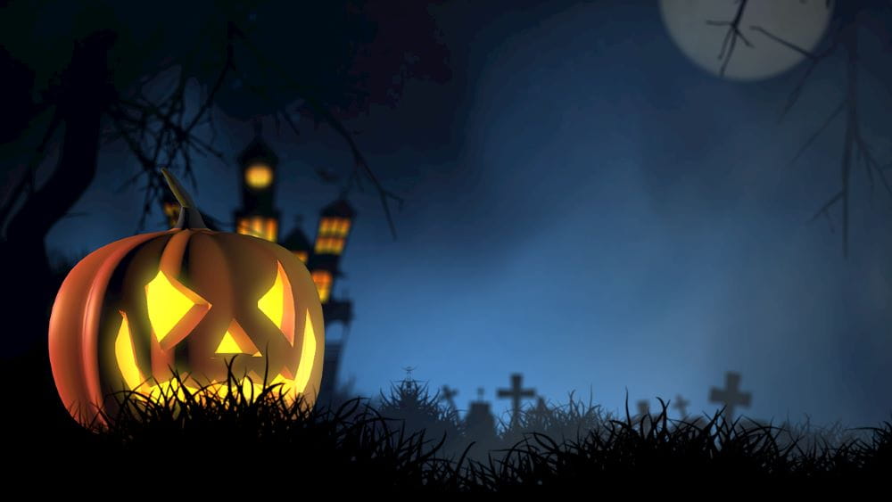 Dibujo de una típica calabaza de Halloween en un cementerio.