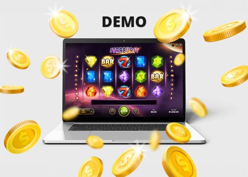 Demo de la slot Starburst en un portátil con monedas alrededor.