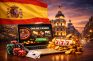 Bandera de España junto a portátil con casino online, fichas y monedas.