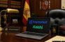 Portátil en despacho oficial español mostrando los logos de Polymarket y Kalshi bloqueados por el Ministerio de Consumo.