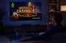 Televisor emitiendo Mega Casino Live Experience en laSexta ante un espectador